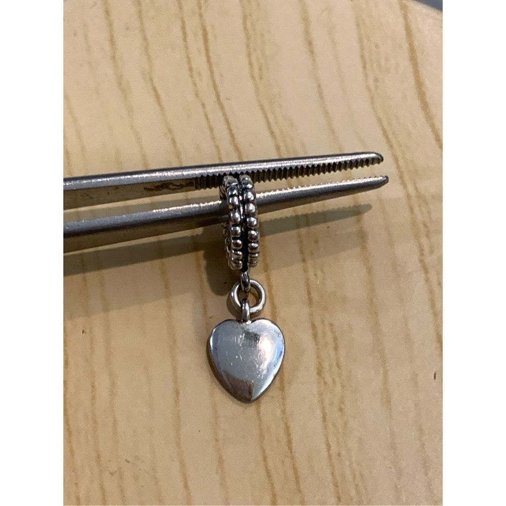 .925 Heart Dangling from Ornate Ring Sterling Silver Jewelry Charm #love